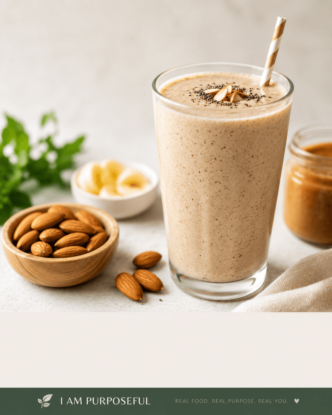 Almond butter banana protein smoothie in a tall glass